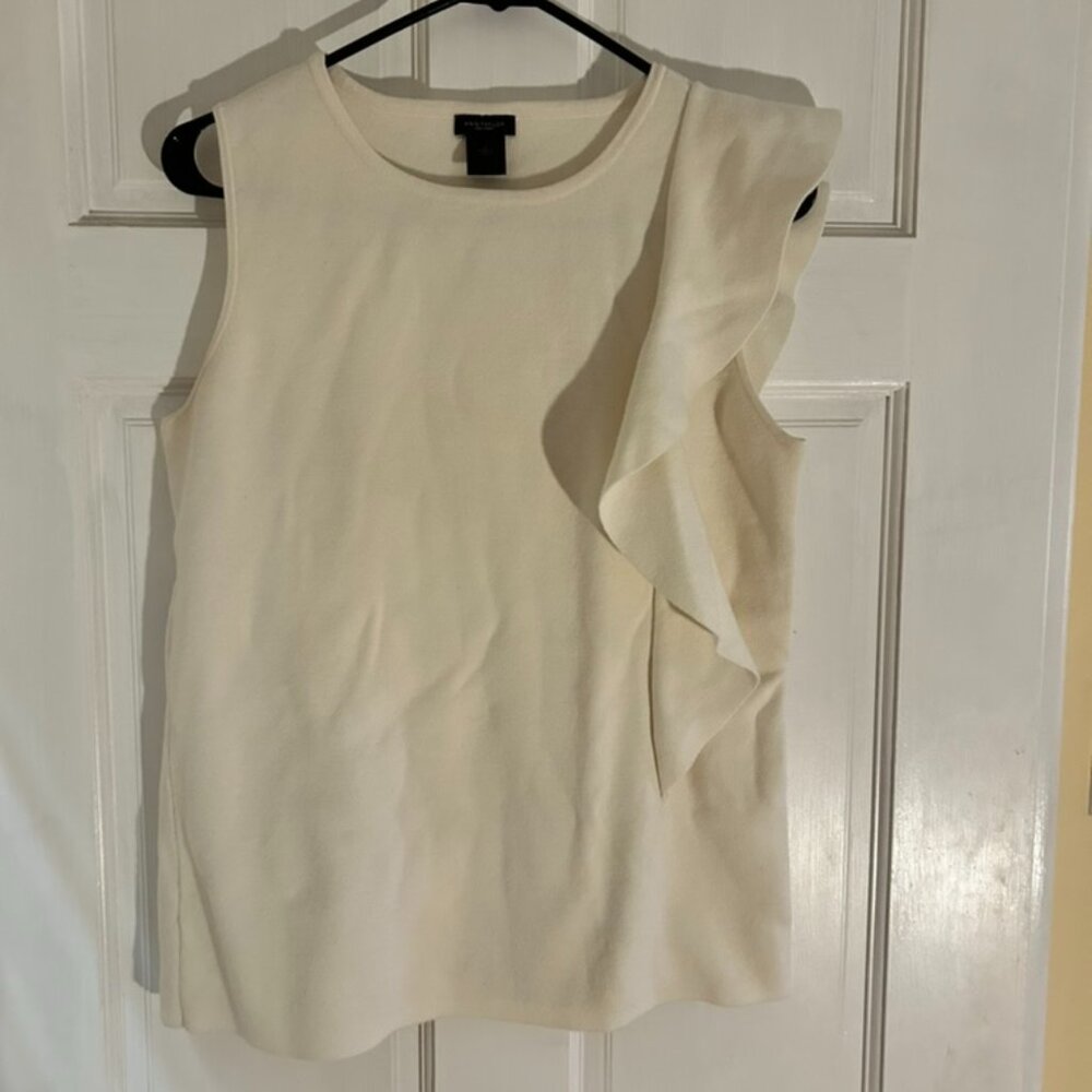 White sleeveless sweater